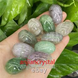 50pcs Wholesale Natural rainbow fluorite egg quartz crystal skull pendant Gem 1