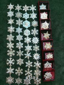 A Vintage Collection Of Gorham Sterling Silver Snowflakes