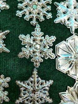 A Vintage Collection Of Gorham Sterling Silver Snowflakes