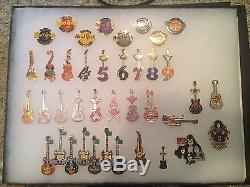 Hard Rock Cafe Pins LOT of 361 Pins Mostly Guitars Pin Collectors Guide