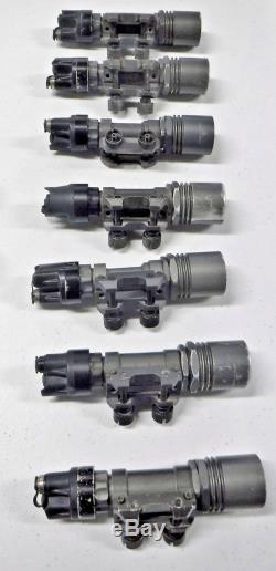 Lot of 9 Surefire Lights with Rail Mounts