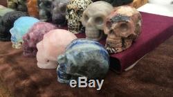WHOLESALE 2 Carved Crystal Skull polished healing stone hematite. Lot of 20