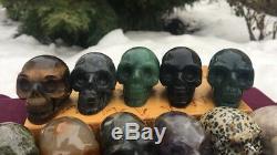 WHOLESALE 2 Carved Crystal Skull polished healing stone hematite. Lot of 20