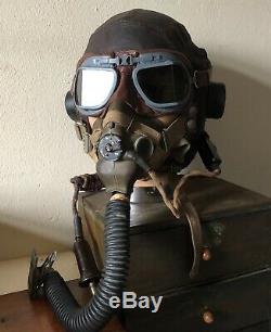 WW2. A RAF flying helmet and cockpit instruments. Former owner Murray Valantine