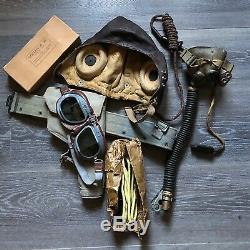 WW2. A RAF flying helmet and cockpit instruments. Former owner Murray Valantine