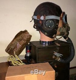 WW2. A RAF flying helmet and cockpit instruments. Former owner Murray Valantine