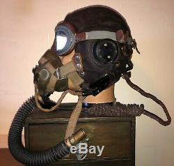 WW2. A RAF flying helmet and cockpit instruments. Former owner Murray Valantine