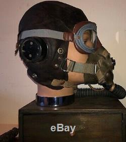 WW2. A RAF flying helmet and cockpit instruments. Former owner Murray Valantine